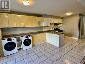 Markham (Middlefield) apartment for rent - A laundry room with a washer and dryer.