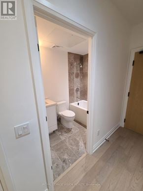 Toronto (Englemount-Lawrence) condo for rent - A bathroom with a toilet, sink, and shower.