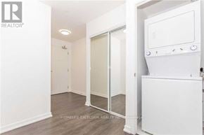 Toronto (Henry Farm) condo for rent - A white oven is in a kitchen with white walls.