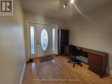 Toronto (East York) apartment for rent - A room with a desk and a chair in it.