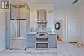Markham (Cornell) apartment for rent - A kitchen with a stainless steel refrigerator and oven.