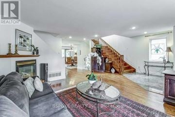 Toronto (Kingsway South) apartment for rent - A living room with a grey couch and a coffee table in the middle.