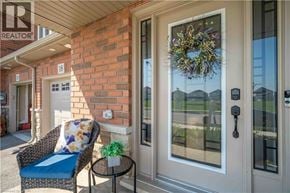 Stoney Creek townhouse for rent - A wreath hangs on a glass door.