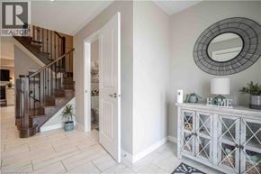 Stoney Creek townhouse for rent - A realtor logo is on the top left corner of the image.