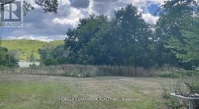 Asphodel-Norwood apartment for rent - A field with trees and a cloudy sky in the background.
