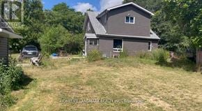 Asphodel-Norwood apartment for rent - A house with a lawn in front of it.