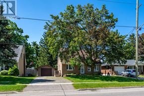 Halton Hills (Georgetown) apartment for rent - A residential street with houses and trees.