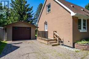 Halton Hills (Georgetown) apartment for rent - A two-story house with a garage and a covered porch.