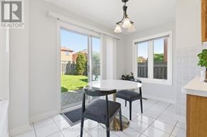 Caledon (Bolton East) apartment for rent - A dining room with a table and chairs is shown.