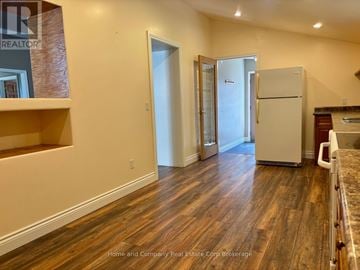 St. Marys apartment for rent - A kitchen with a refrigerator and a countertop.