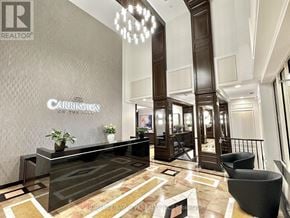 Toronto (Banbury-Don Mills) condo for rent - A reception area with a sign that says Carrington on the wall.