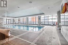 Toronto (Waterfront Communities) condo for rent - A waiting area with a couch, chairs and a table.