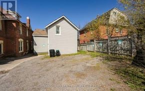 Barrie (Codrington) duplex for rent - A house with a fence in front of it is for sale.