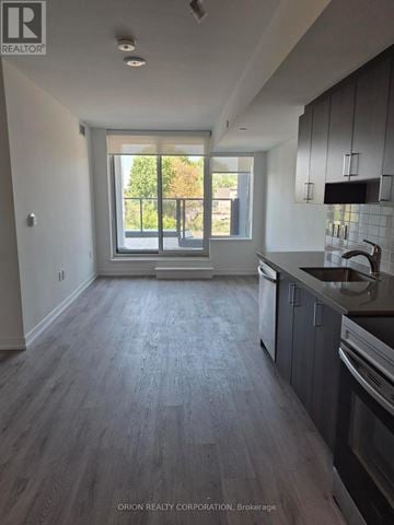 Toronto (Yorkdale-Glen Park) condo for rent - A kitchen with a sink and a window.