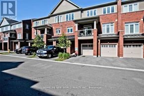 Pickering (Duffin Heights) townhouse for rent - A building with the sign "Homelife New World Realty Inc., Brokerage" in front of it.