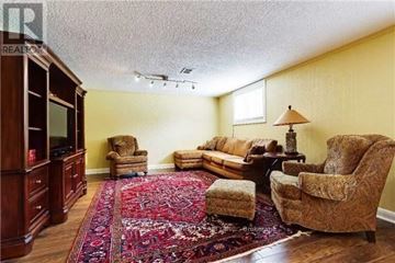 Toronto (Willowdale West) apartment for rent - A living room with a rug and a sofa.