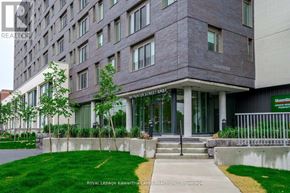 Peterborough (Ashburnham Ward 4) condo for rent - A modern building with a green lawn in front.