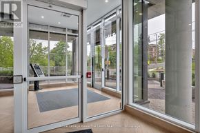 Peterborough (Ashburnham Ward 4) condo for rent - A white door with a glass window and a sign that says "REALTOR" on it.