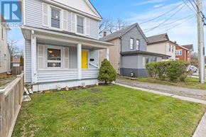 Welland (Broadway) apartment for rent - A house with a well-maintained lawn in front of it.