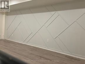 Markham (Berczy) townhouse for rent - A wall with a geometric pattern painted on it.