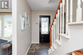 Milton (Dp Dorset Park) apartment for rent - A hallway with a black door and white walls.