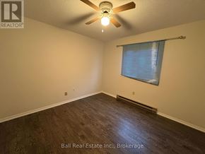 Kawartha Lakes (Bobcaygeon) multi-family for rent - A room with a ceiling fan and a window with blinds.