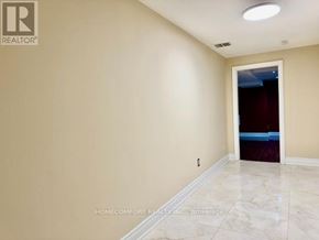 Richmond Hill (Bayview Hill) apartment for rent - A room with beige walls and a marble floor.