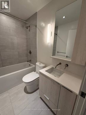 Toronto (Mount Pleasant West) condo for rent - A bathroom with a toilet, sink, and bathtub.