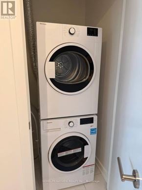 Toronto (Mount Pleasant West) condo for rent - A white dryer and washer are stacked on top of each other.
