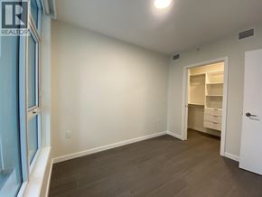 Burnaby apartment for rent - A room with a doorway leading to another room.