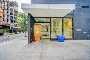 Toronto (Church-Yonge Corridor) condo for rent - The entrance to a building with a sign that reads "77 Shuter Street".