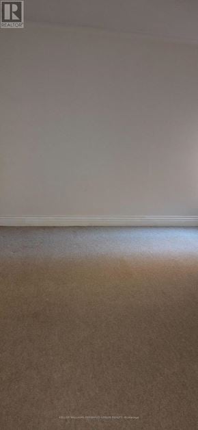 Toronto (Roncesvalles) apartment for rent - A plain white wall with a light switch on the right side.