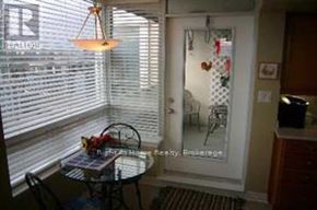 Toronto (Bayview Village) condo for rent - A dining room with a table and chairs.