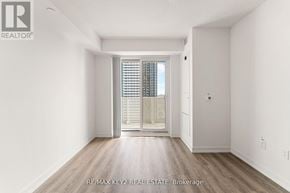Vaughan (Vaughan Corporate Centre) condo for rent - A room with a sliding door leading to a balcony.