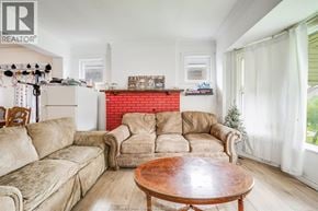 Windsor apartment for rent - A living room with a couch, chair, and coffee table.