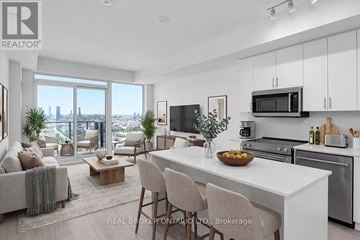 Vaughan (Vellore Village) condo for rent - A modern kitchen with a dining table and chairs.