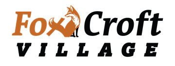 Martinsburg apartment for rent - A logo with a fox and the words "Fox Croft Village" in orange and black.