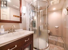 North Vancouver apartment for rent - A bathroom with a shower stall and a sink.
