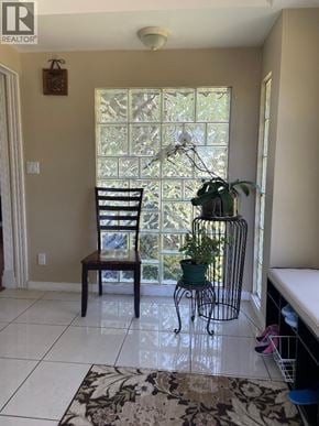 North Vancouver apartment for rent - A chair sits in front of a window with a plant on a table.