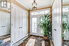 Mississauga (Lakeview) apartment for rent - A hallway with a rug and a plant in a pot.