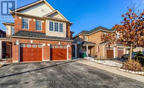 Brampton (Gore Industrial North) apartment for rent - A large house with a brown garage door is for sale.