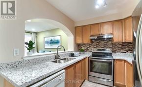 Brampton (Gore Industrial North) apartment for rent - A kitchen with granite countertops and stainless steel appliances.