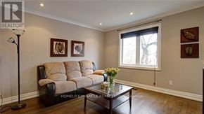 Mississauga (Lakeview) apartment for rent - A living room with a couch, coffee table, and pictures on the wall.