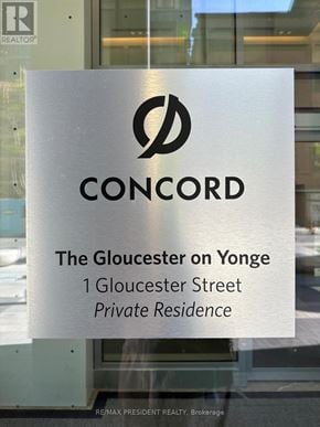 Toronto (Church-Yonge Corridor) condo for rent - A sign for Concord reads "The Gloucester on Yonge" in front of a window.