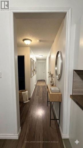 London North (North N) apartment for rent - A hallway with a wooden floor and white walls.