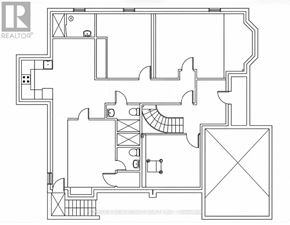 Mississauga (Erin Mills) apartment for rent - A floor plan of a house with a staircase and a kitchen area.