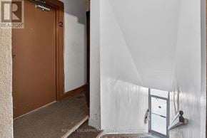 Grimsby (Grimsby East) apartment for rent - A brown door with a number 2 on it.