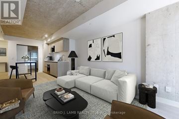 Toronto (Church-Yonge Corridor) condo for rent - A living room with a white couch and a coffee table.