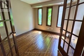 Pickering (Woodlands) apartment for rent - A room with wooden floors and windows.