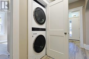 London East (East G) fourplex for rent - A washer and dryer in a laundry room.